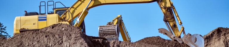 Machines at work on a construction site.