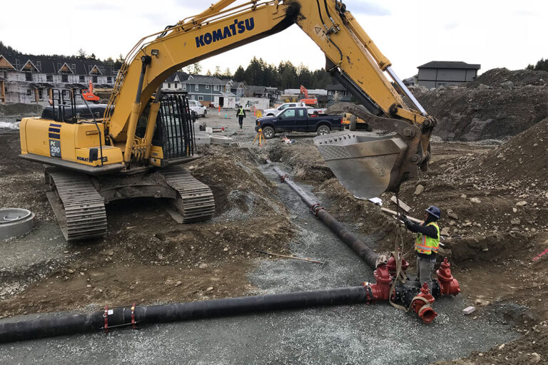 A construction site featuring heavy machinery in action.