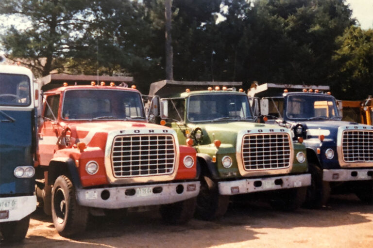 Trucks parked side by side.